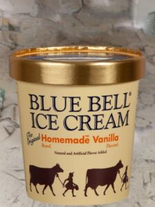 A bowl of Blue Bell homemade vanilla ice cream, showcasing its creamy texture and rich flavor, labeled as the best ice cream.